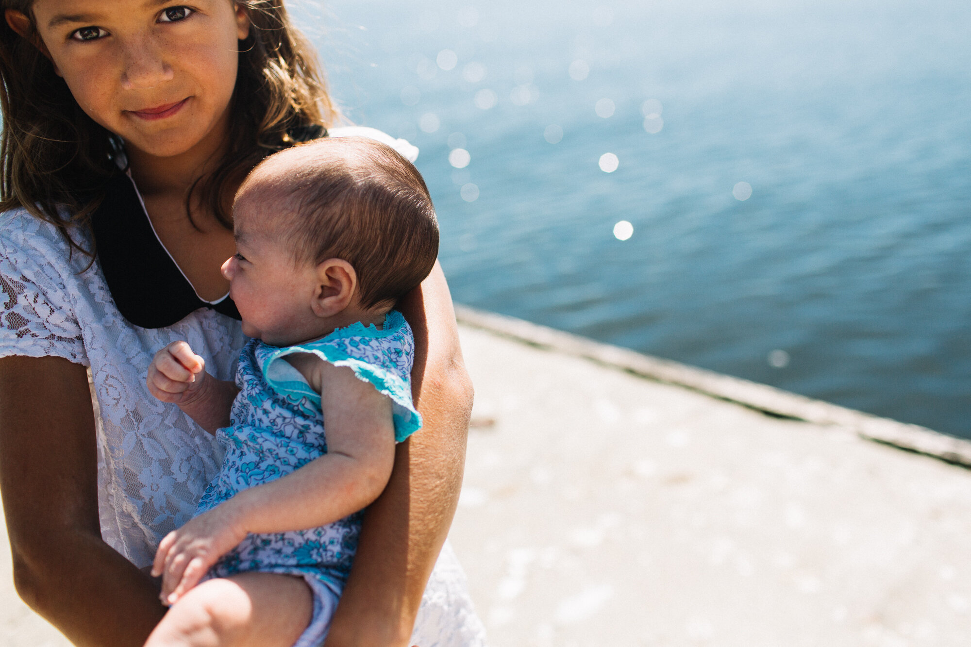 Glittery sunshine reflected off the ocean in this sweet family session on Vancouver Island