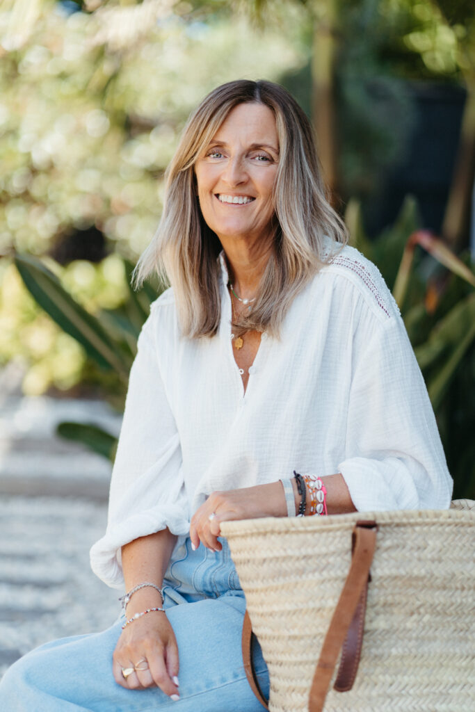 Lifestyle headshot portrait of surf coast artist Penny Byrne outside her home by Bobby Dazzler Photography