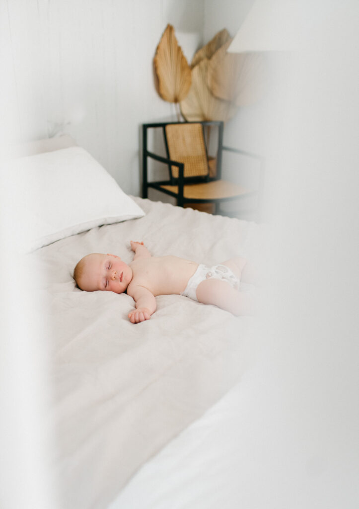 Photo of sleeping baby at the Rook and Rose loft in Victoria BC.